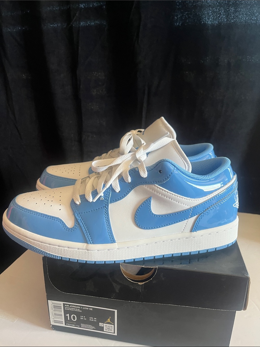 Air Jordan 1 Low SE Sneakers in White and Light Blue